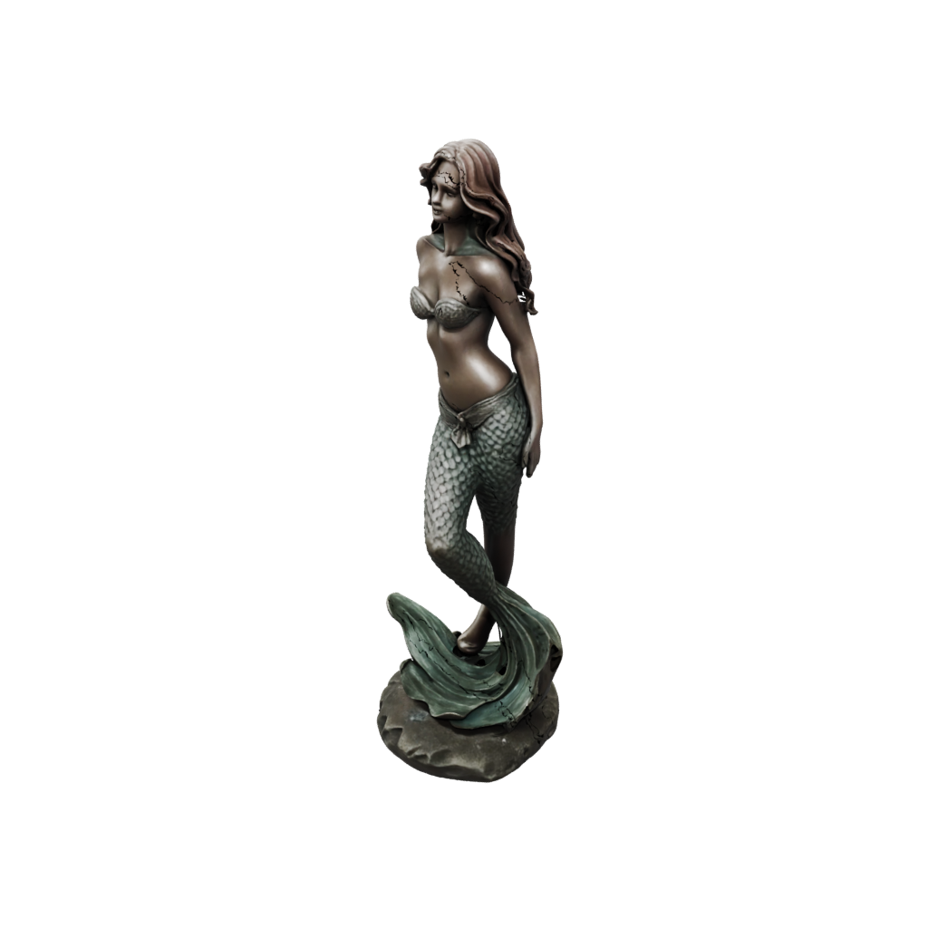 Bronze Mermaid On A Rock