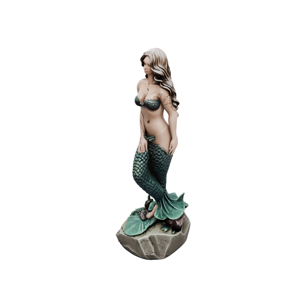 Mini Mermaid On A Rock